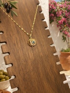 Gold-Tone Sunburst Pendant Necklace with Blue Center